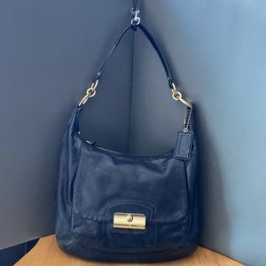 Coach Med size black pebble grain leather hobo, with gold hardware! Perfect cond